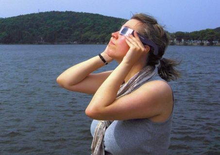 Always use a safe solar filter when looking at the Sun during a partial or annular eclipse. The only time a filter is not needed is when the Sun is totally eclipsed. (Photo by Ryan Milligan/NASA)