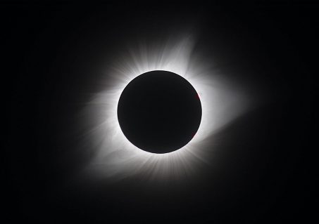 Only when the Moon completely covers the Sun, and its pale corona is revealed, can you gaze Sunward without using solar filters. (Photo by Rick Fienberg/TQ)